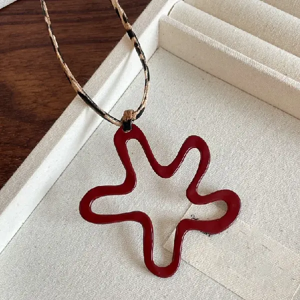 9-Spray-painted leather flower pendant necklace,tkmbeautysupply.com