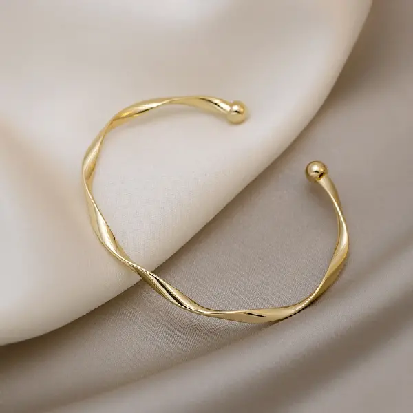 37 gold open bracelet.,tkmbeautysupply.com