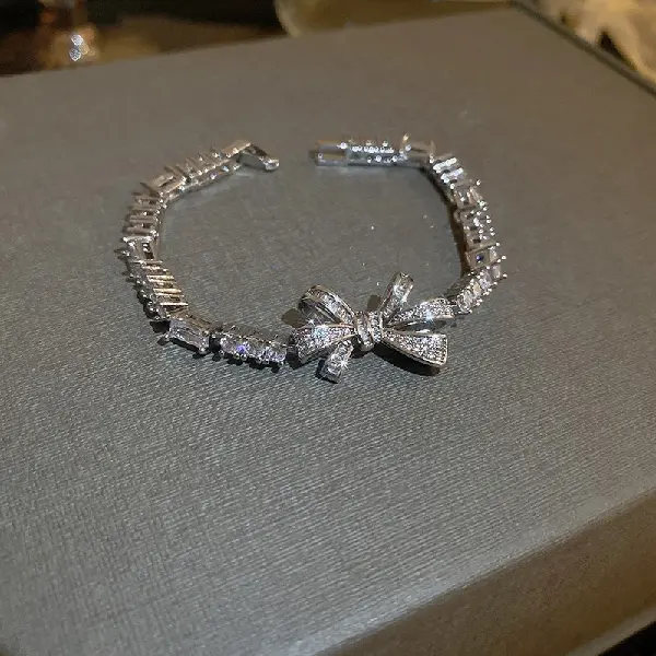 15# bracelet-silver bow stitching.,tkmbeautysupply.com