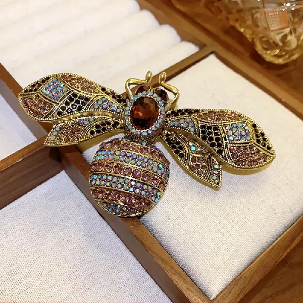 6# brooch - diamond-encrusted dragonfly and bee wings in contrasting colors,tkmbeautysupply.com