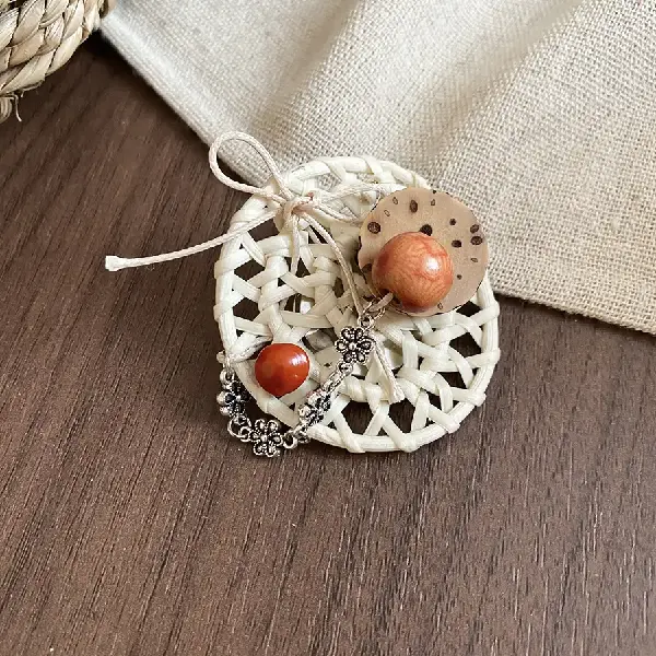 60# brooch-rattan hollow wooden beads flower bow tassels,tkmbeautysupply.com