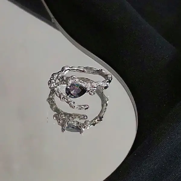 63. Ring-Geometric pleats with diamonds,tkmbeautysupply.com