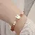Wholesale Natural Strawberry Crystal Pink Bracelets for Retailers - 6069 strawberry crystal shell rabbit bracelet