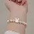 Wholesale Natural Strawberry Crystal Pink Bracelets for Retailers - 6069H Pearl Shell Rabbit Bracelet