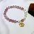Wholesale Natural Strawberry Crystal Pink Bracelets for Retailers - 6070 Strawberry Crystal Gold Coin Bracelet