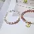 Wholesale Natural Strawberry Crystal Pink Bracelets for Retailers - 6070H Simple Pearl Strawberry Crystal Bracelet