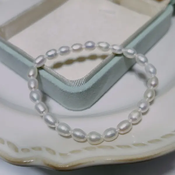 4 white rice pearl bracelet,tkmbeautysupply.com