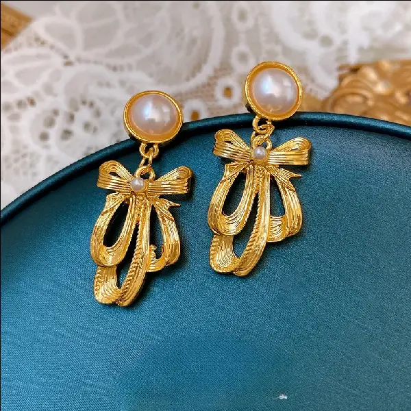 Silver Needle Pearl Bow Earrings,tkmbeautysupply.com