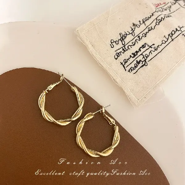 69# silver needle-golden twist earrings.,tkmbeautysupply.com