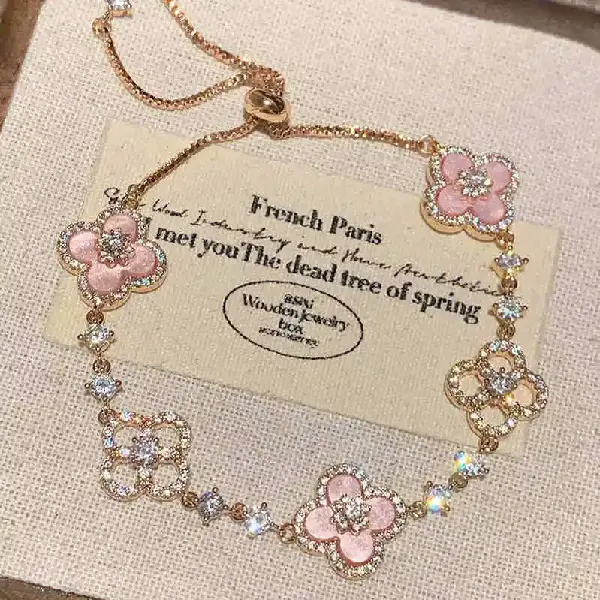1# diamond-encrusted resin clover bracelet,tkmbeautysupply.com