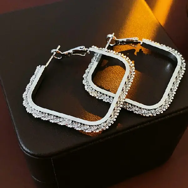 114# Silver Needle Diamond Twist Twisted Earrings,tkmbeautysupply.com