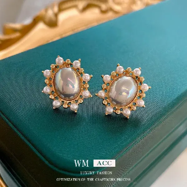 104# Silver Needle-Golden Pearl Oval Stud Earrings,tkmbeautysupply.com