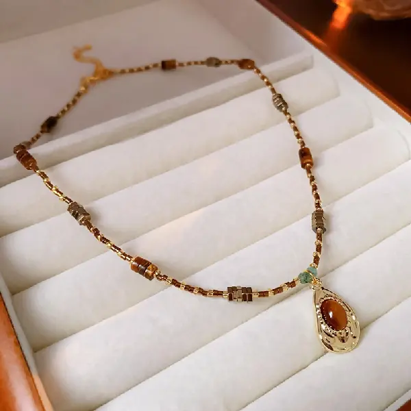 Necklace-brown oval irregular.,tkmbeautysupply.com