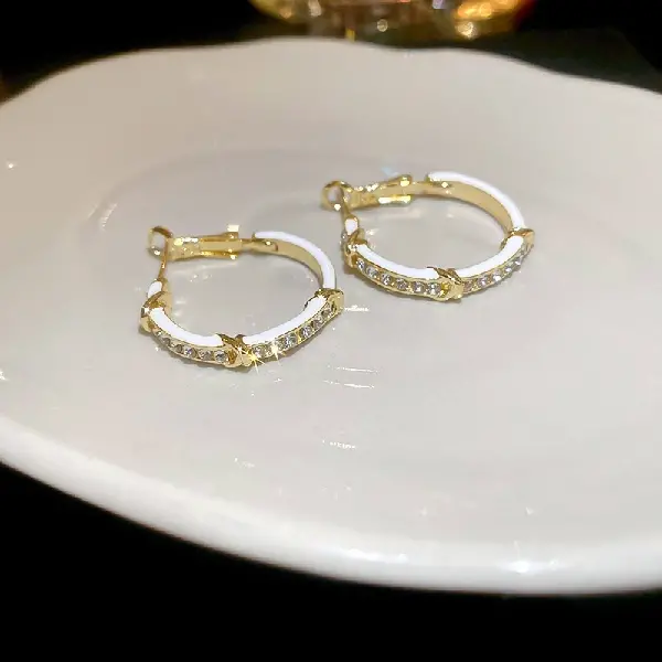 Silver needle oil-drip diamond knotted earrings,tkmbeautysupply.com