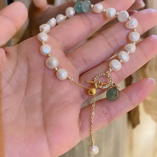 Real gold electroplated pearl and jade bracelet,tkmbeautysupply.com