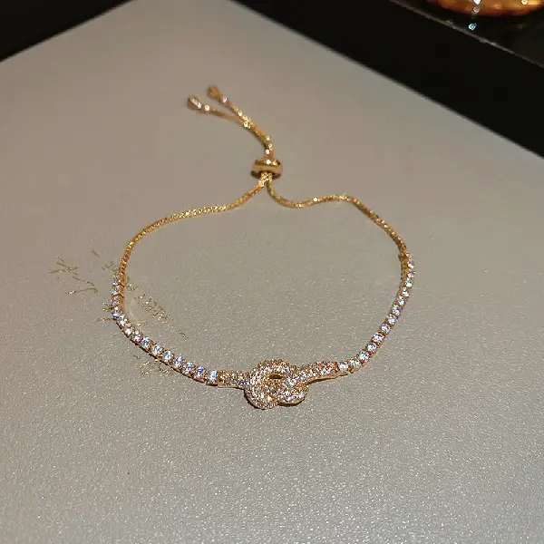 Real gold electroplated zircon knot bracelet,tkmbeautysupply.com
