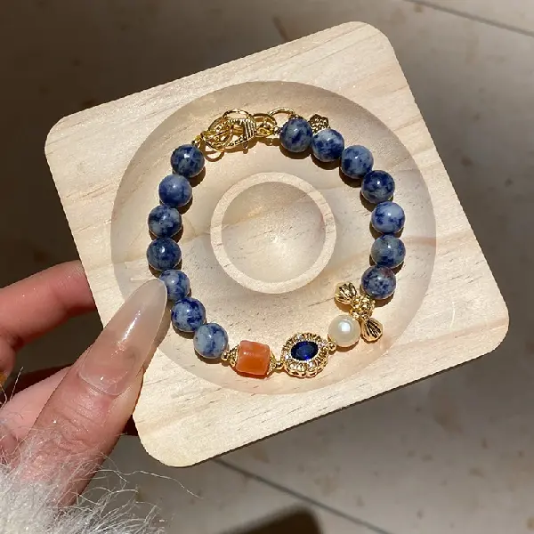 17# bracelet-gold-blue-lotus,tkmbeautysupply.com